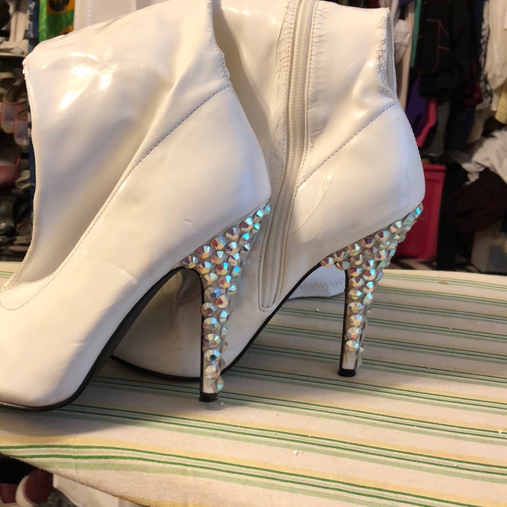 Size 6 white boots with crystals.